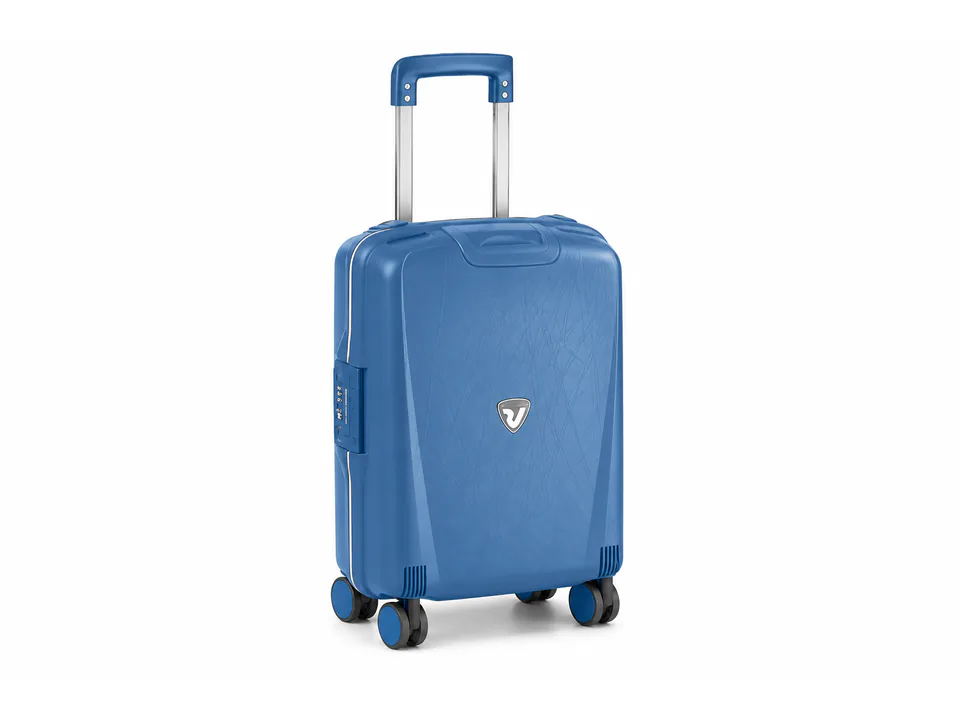 Maleta Roncato Light azul con tirador de doble tubo y cuatro ruedas